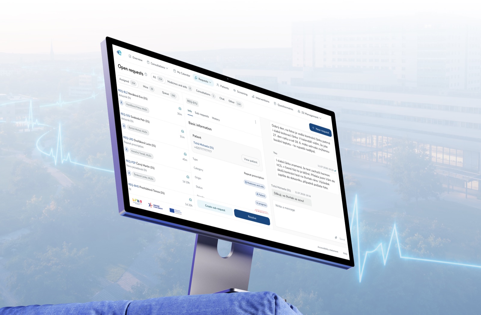 FNOL telemedicine portal showing consultation requests on a desktop monitor.